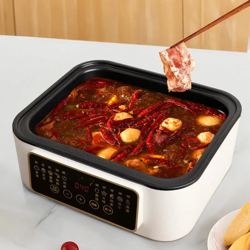 28-litre stainless steel electric food steamer with automatic measuring function on a kitchen counter.