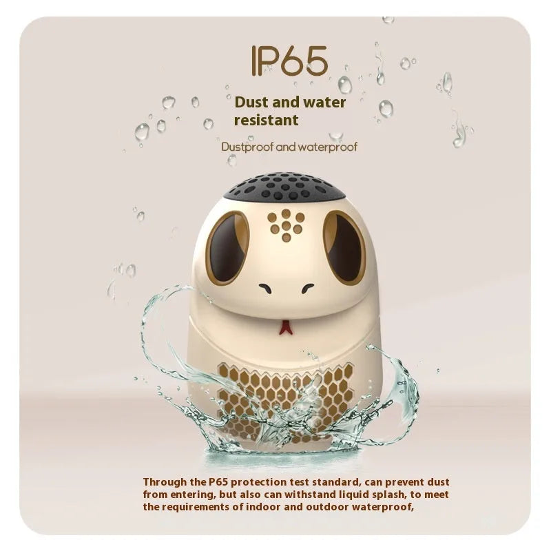 TK900 white cartoon Bluetooth speaker with lighting effects showing waterproof construction