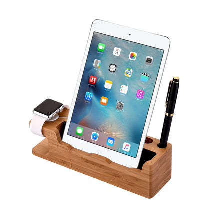 Carbonized bamboo dual phone and watch holder on a desk