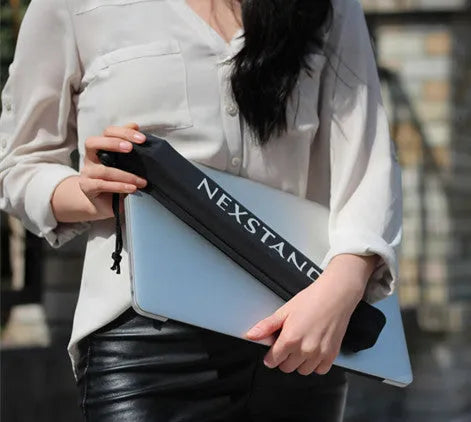 Black folding portable laptop stand made from reinforced nylon, shown in both open and compact folded positions.