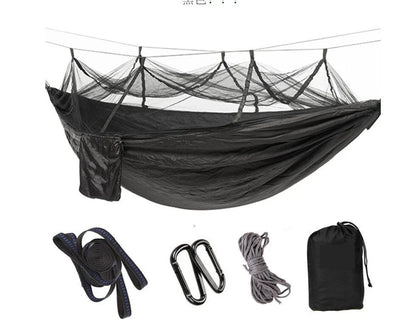 Parachute hammock with mosquito net in various colors and sizes, ideal for outdoor adventures and relaxation