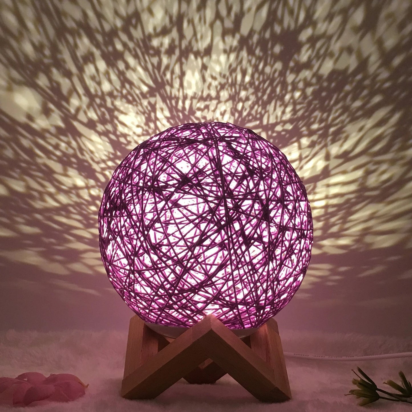 LED rattan table lamp with hand-knit lampshade in various colours