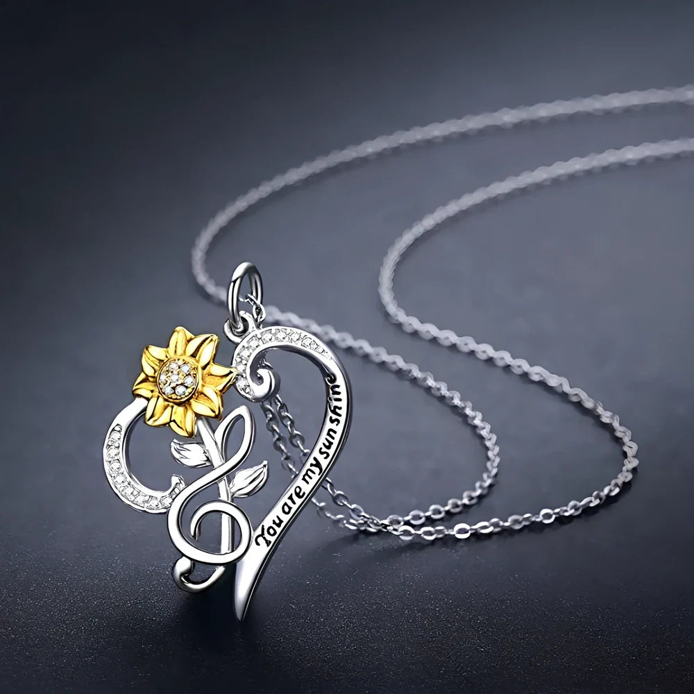 Close-up of S925 sterling silver sunflower necklace with 2cm etched pendant on 45cm chain