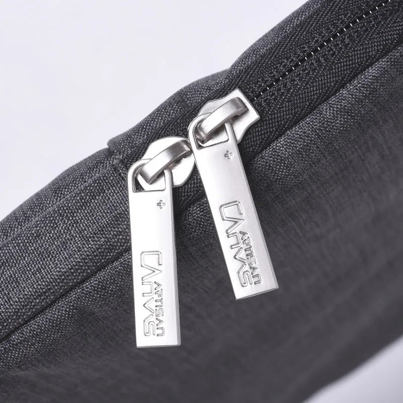 Light grey 15-inch computer liner bag with water-repellent polyester surface, slim 3cm profile