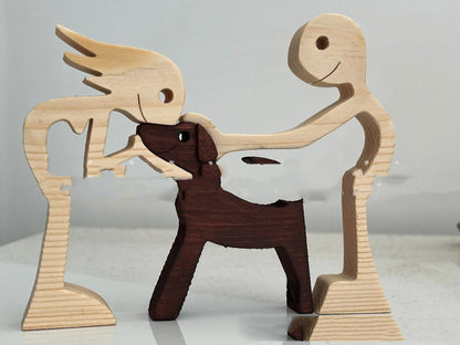 Handcrafted wooden dog sculpture featuring a man and his loyal canine companion