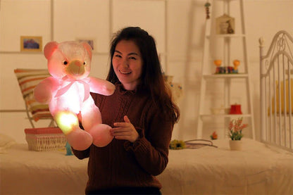 Colorful light-up plush teddy bear with over 7 changing LED colors, a cozy and unique Christmas gift for kids