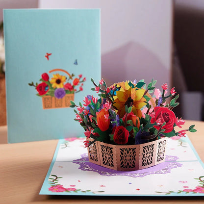 Handmade 3D pop-up floral bouquet card for Mother's Day with navy blue envelope