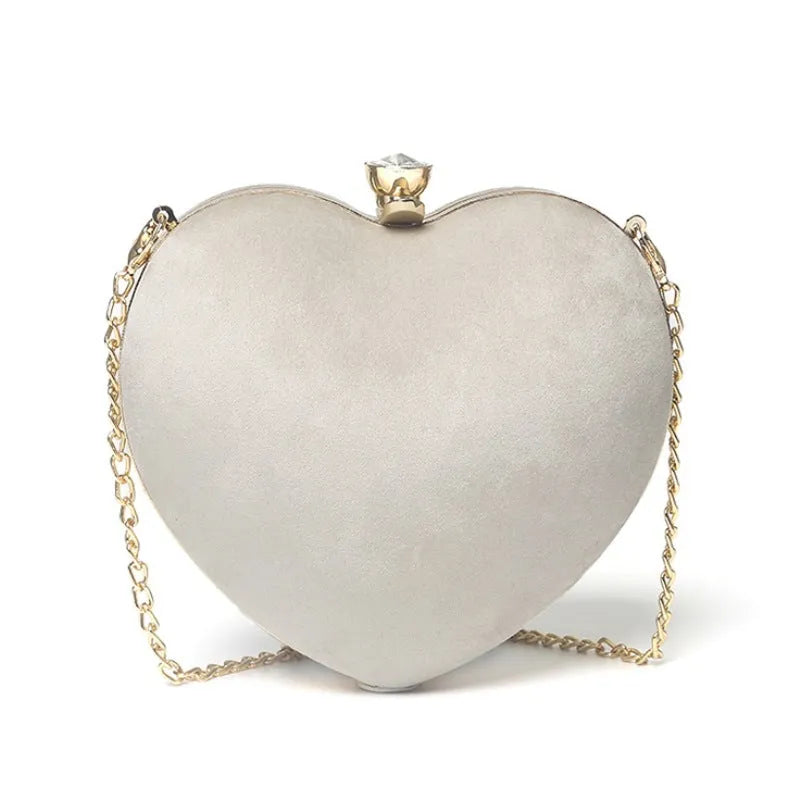 Heart-shaped plush cotton chain bag in pink with chain strap and hook closure