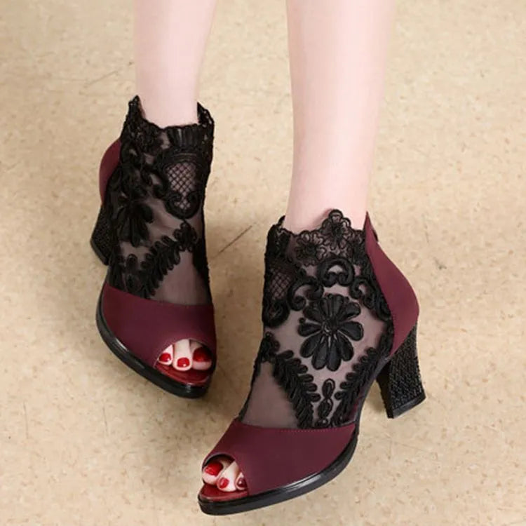 Women's black lace gladiator sandals with square high heel and zip closure side view