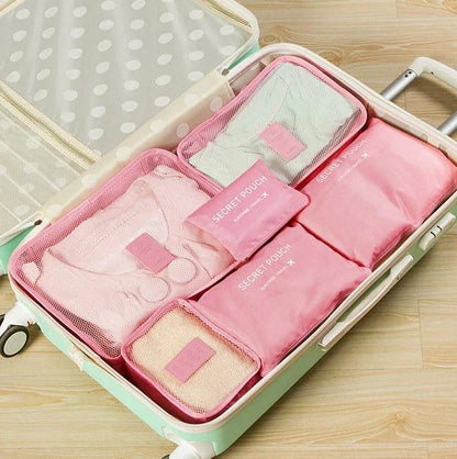 Durable waterproof packing cubes in various colors for organized, efficient travel