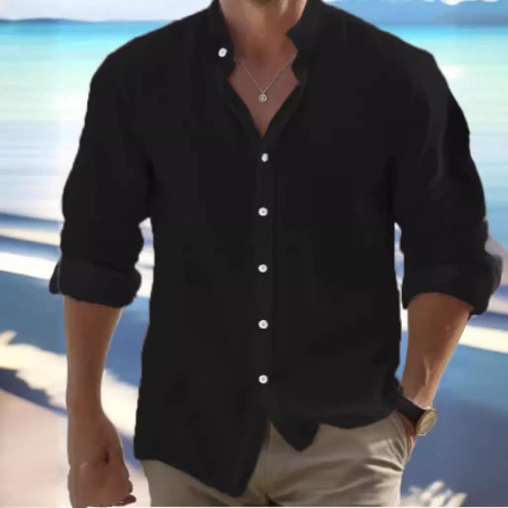 Man wearing a light blue long-staple cotton pullover summer shirt with casual collage stitching details.