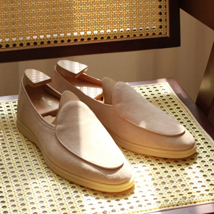 Men's handmade brown leather loafers with a low tube design and light TPR sole.
