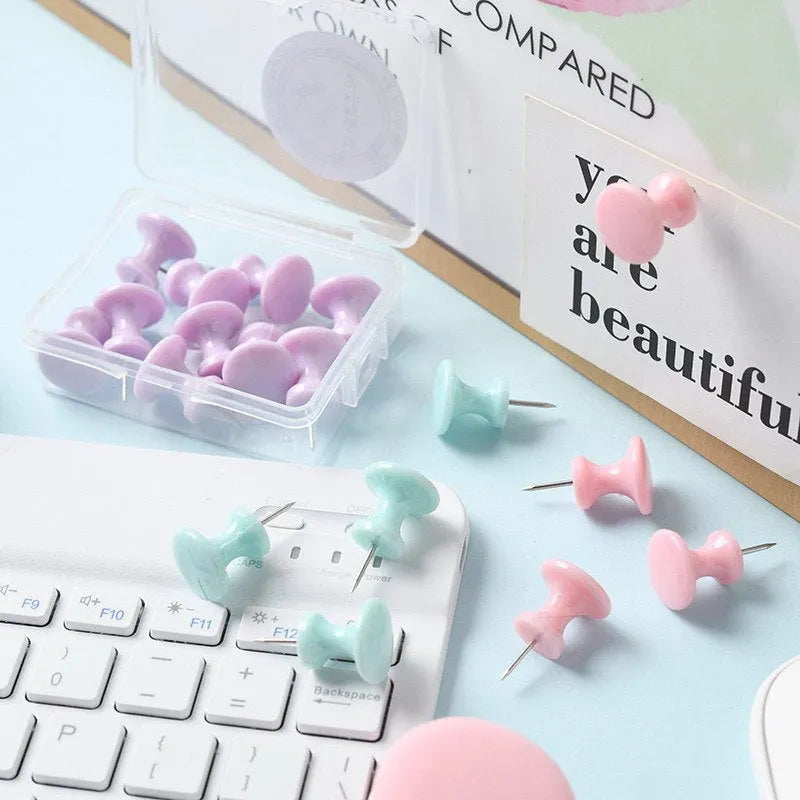 Box of 40 plastic push pins in macaron colours: cherry blossom pink, mint green and lavender.