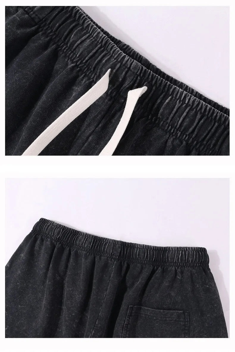 Men's vintage washed loose drawstring shorts in 100% cotton, black colour, front view