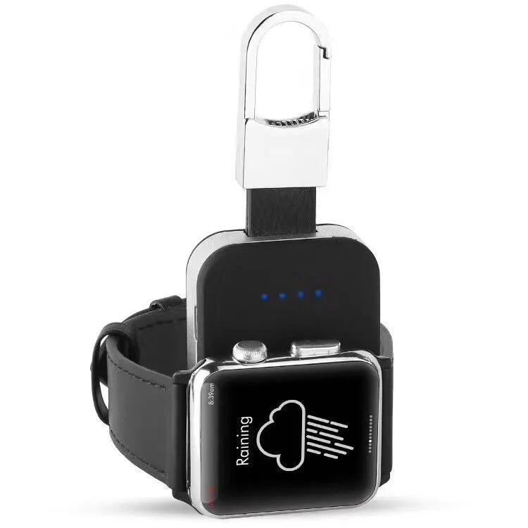 Black portable wireless power bank keychain for charging Apple Watch on a keyring.