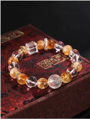 Women's white crystal beaded bracelet with yellow freshwater pearls and citrine yellow tower crystal accents