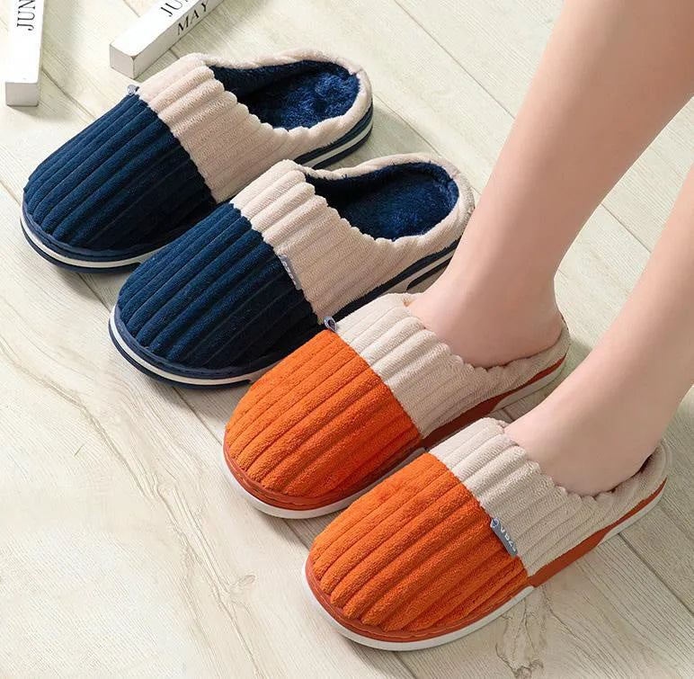 Unisex winter slippers in candy colour, suede upper, TPR sole, Baotou style, on a clean background.