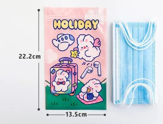 Green, blue, purple and pink rectangle packaging bags with cute rabbit designs for snacks and gifts.