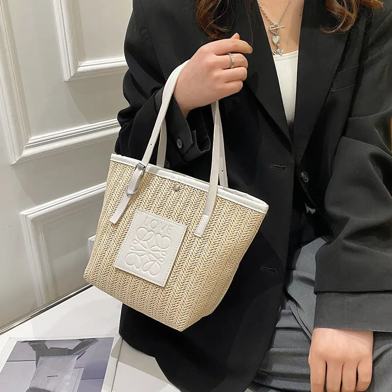 Women's straw woven shoulder bag in European retro style with three-dimensional pockets