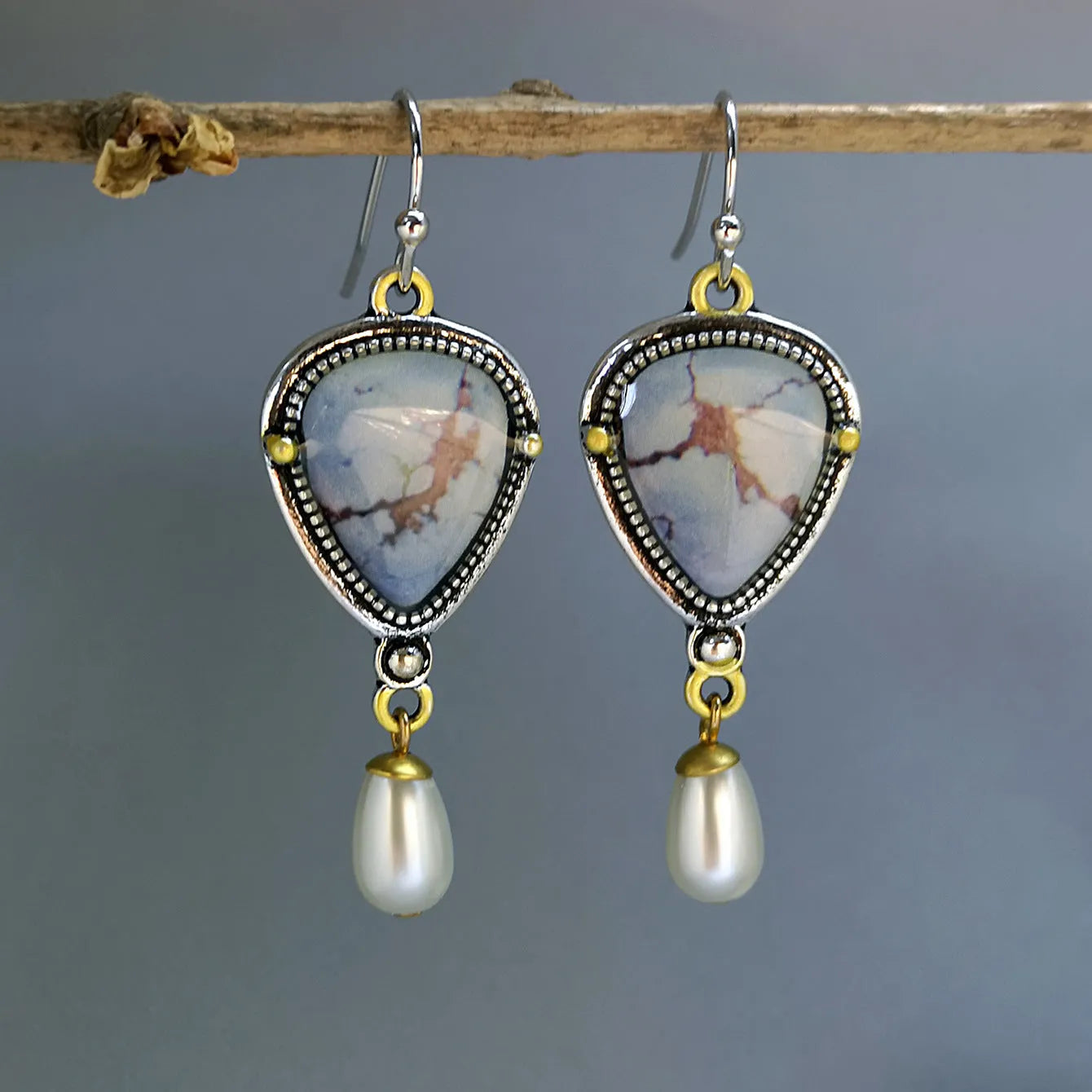 Retro blue women's drop earrings with synthetic opal, pearl, and geometric metalwork.