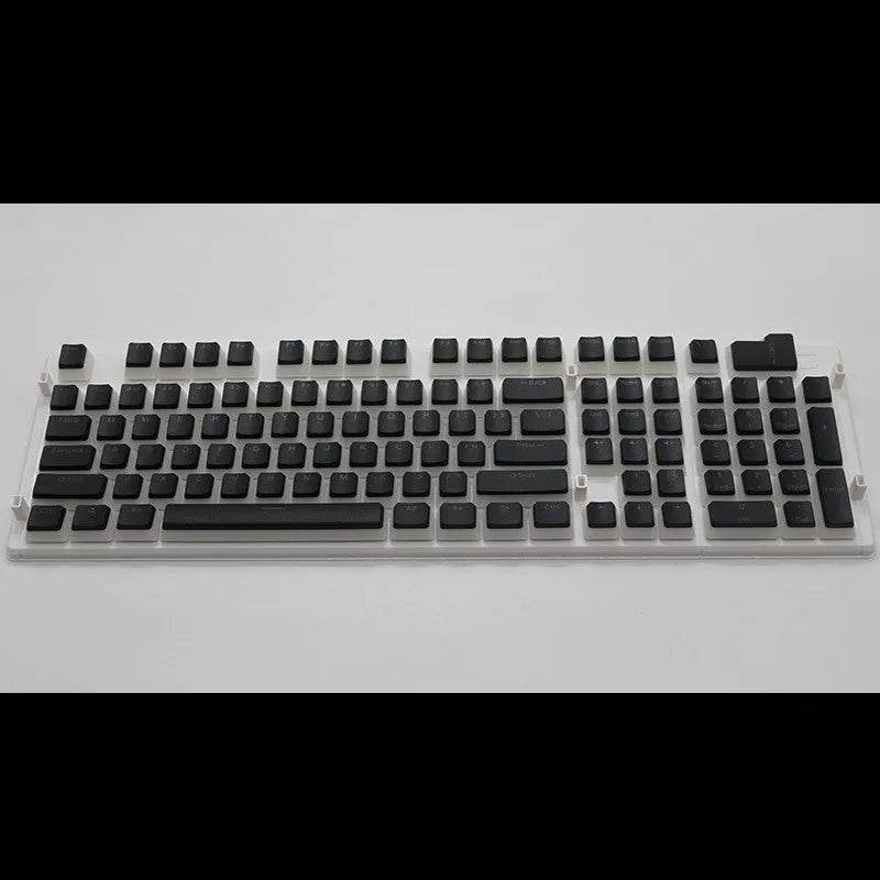 Set of 108 PBT keycaps with double-skin pudding cream design in various colours for mechanical keyboards.