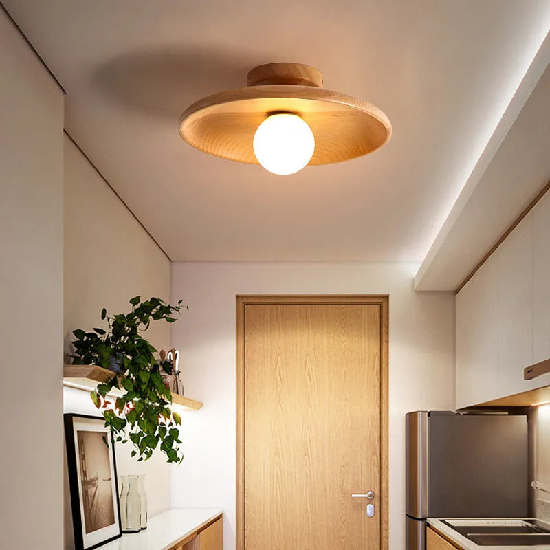 Solid wood ceiling lamp with glass shade in minimalist circular design