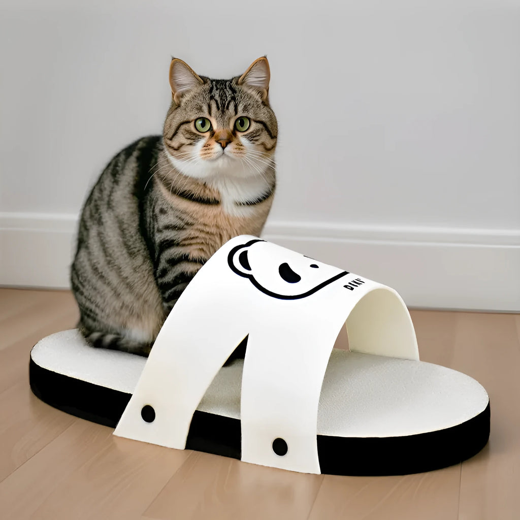 White slipper-shaped cat scratch board made from corrugated paper.