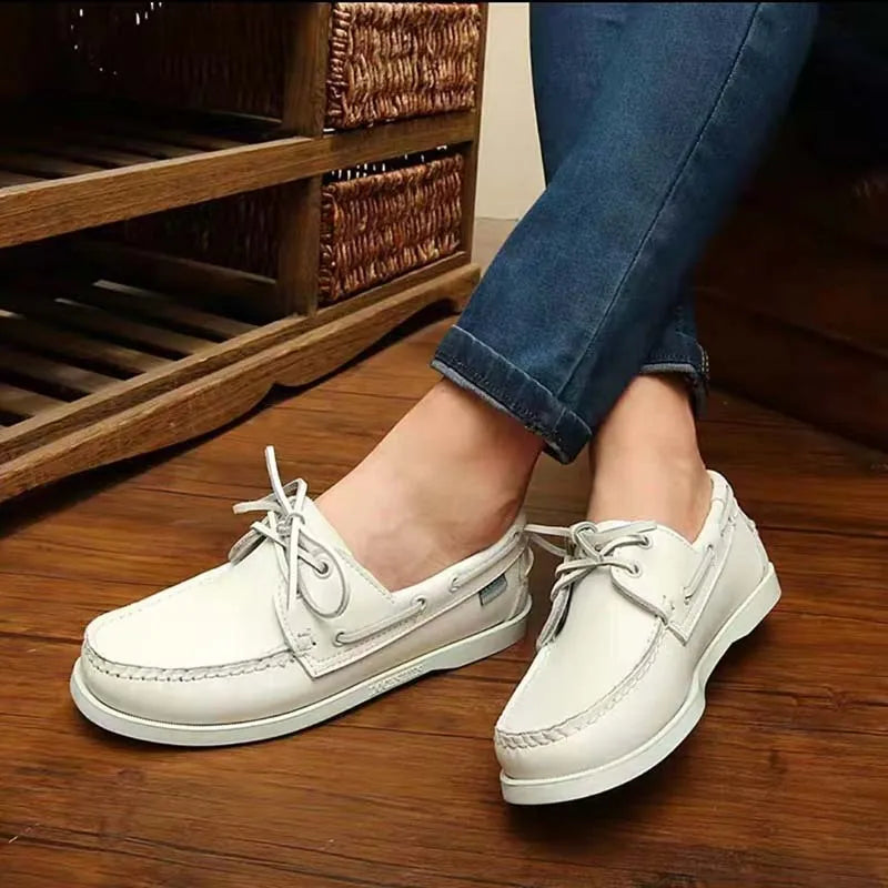 Men's flat-heel casual shoes with round toe in artificial PU, shown in solid colour options.
