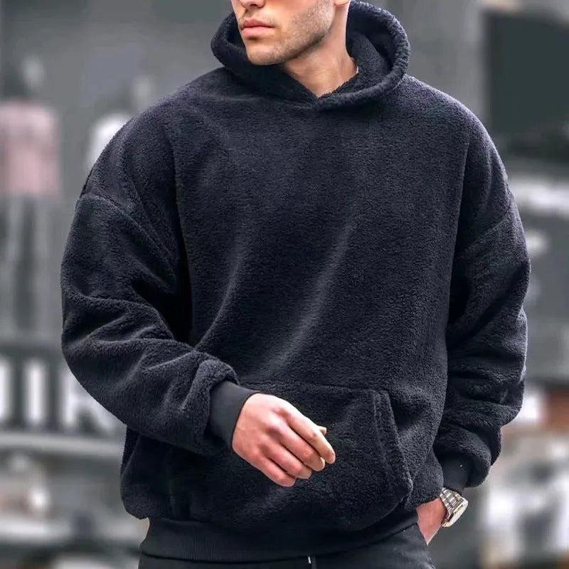 Men's fleece-lined lamb wool hooded sweater in black, front view, with hood and patch pockets