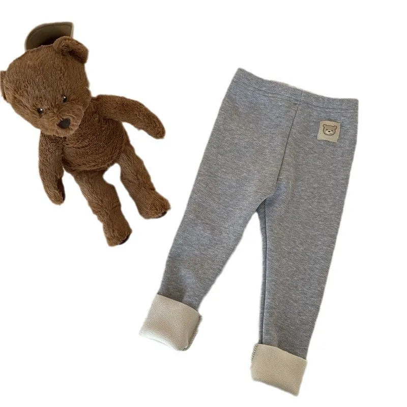 Girls solid colour fleece-lined leggings with high waist and hair band belt, shown in beige, black, brown, grey.