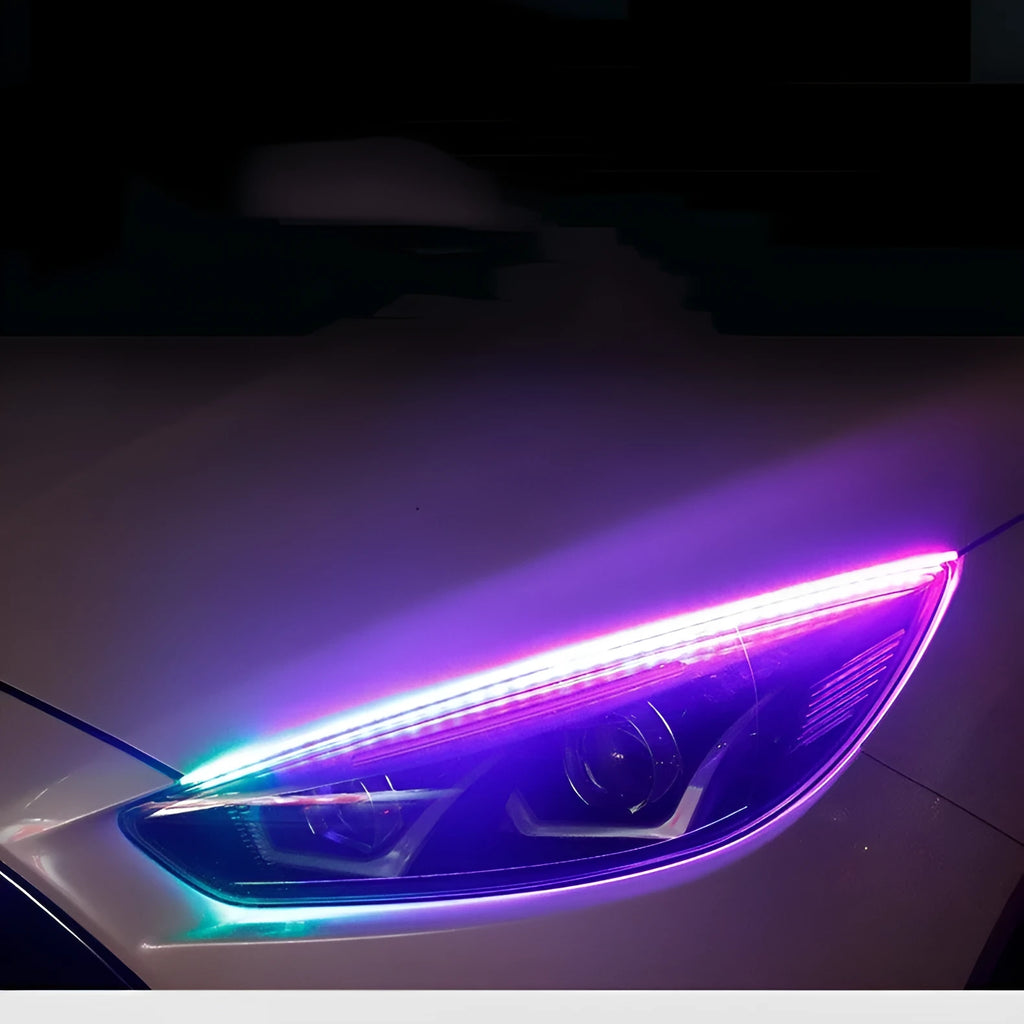 RGB colour LED car daytime running light strip with remote control on a white background.
