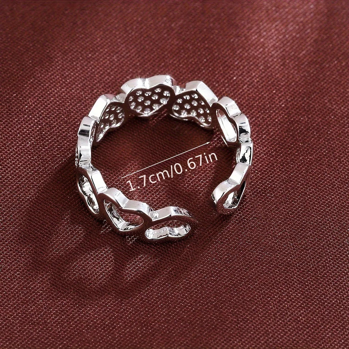 Adjustable geometric copper couple ring with love heart detail in gold or silver colour.
