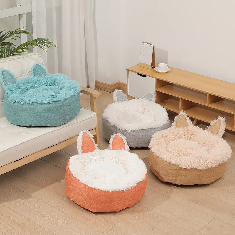 Blue faux fur plush enclosed cat bed house on a wooden floor