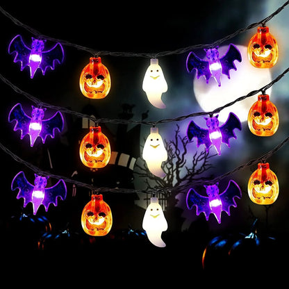 LED Halloween string lights with pumpkin, spider, bat, and skull designs in purple and green