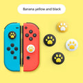 Set of four silicone rocker caps and sleeves for Nintendo Lite console in assorted colours.