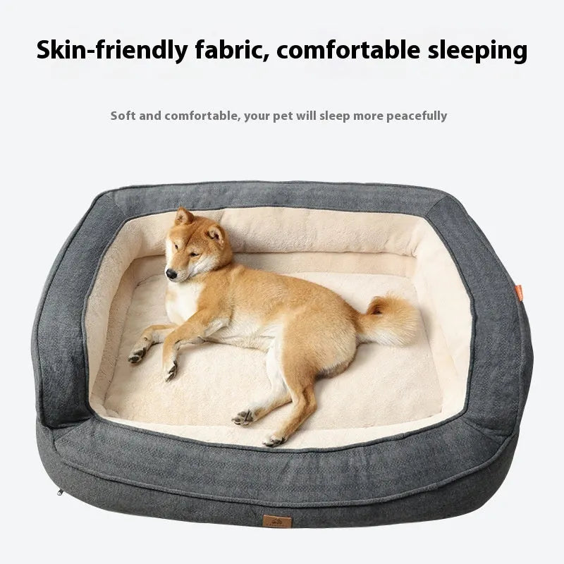 Rust red sofa-style dog bed with removable washable cloth cover, size XL, on a light floor