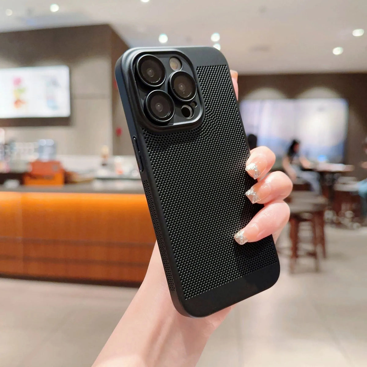 Ultra-thin PC phone case with heat dissipating mesh shell for iPhone 15, coloured Black, showing slim fit glass cover