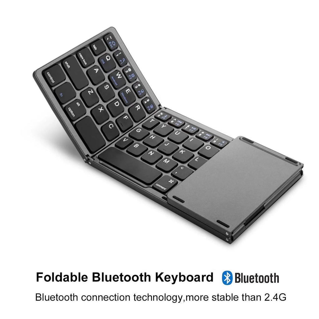 Black tri-fold Bluetooth keyboard shown open next to a smartphone, demonstrating its portable size.