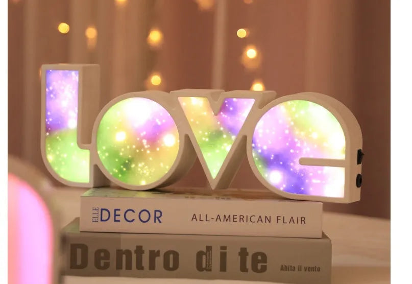 Rainbow halo style LED LOVE light sign measuring 35.5 x 13.5 cm for Valentine's Day decoration
