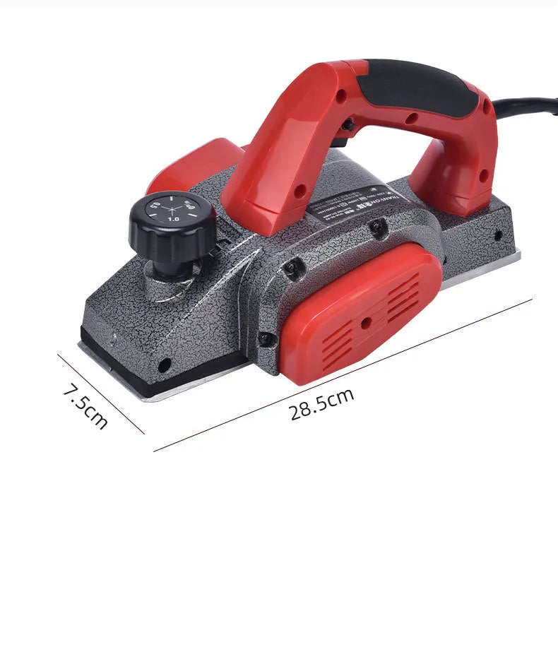 Red desktop electric wood planer with aluminium body showing 82mm planing width and depth adjustment controls