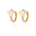 Gold heart-shaped zircon stud earrings with a clip back fastening for women.