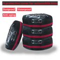 Four black Oxford cloth tyre protective covers laid flat, showing their circular shape and belt-style detailing.
