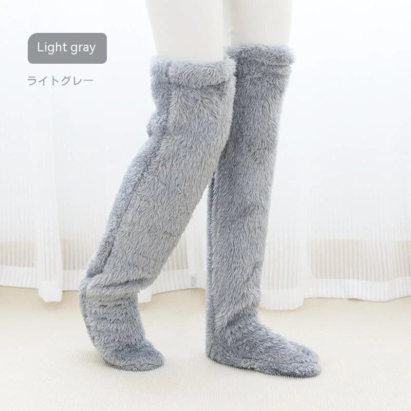 Cozy over-the-knee fuzzy socks in various colors, designed to keep your legs and knees warm during the winter season.