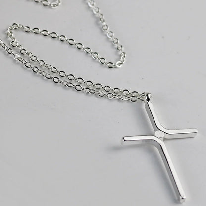 Titanium steel cross pendant necklace with water wave chain and inlaid gold treatment