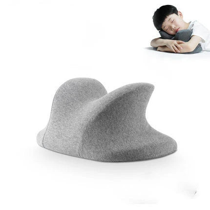 Ergonomic memory foam nap pillow with unique 'butterfly' design for comfortable desk-side power naps