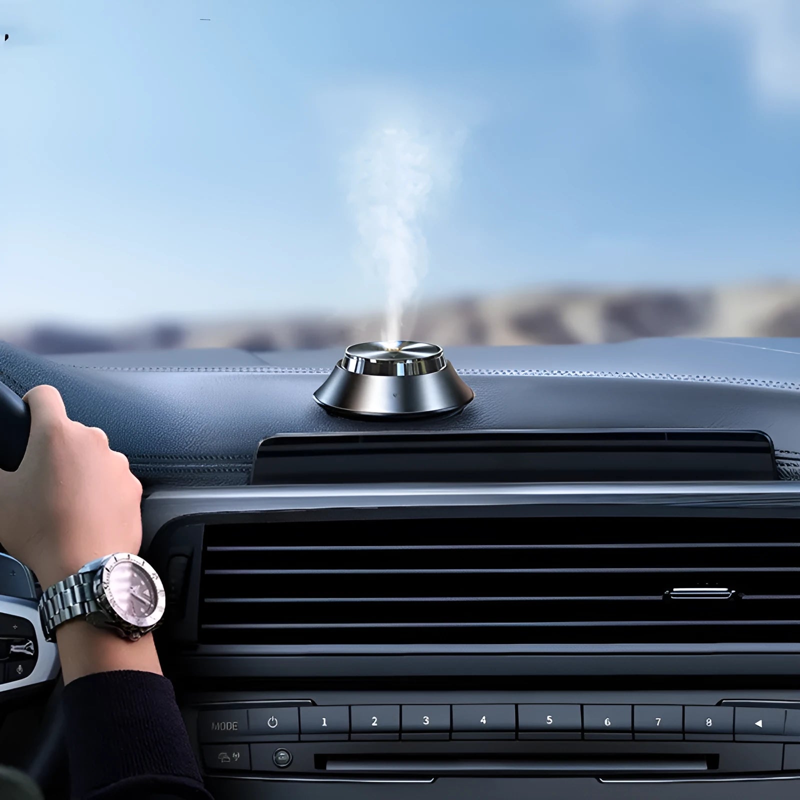 Black butterfly-shaped metal car aromatherapy diffuser with USB cable and essential oil bottle
