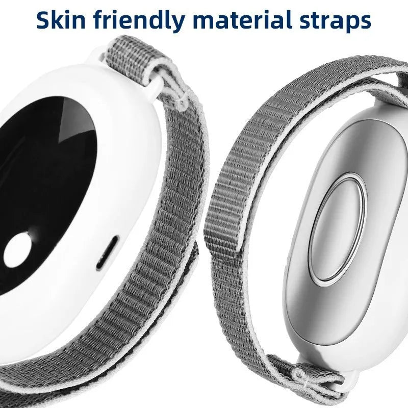 White handheld sleep aid instrument with remote control, sleep bracelet, and USB charging cable on a neutral background.