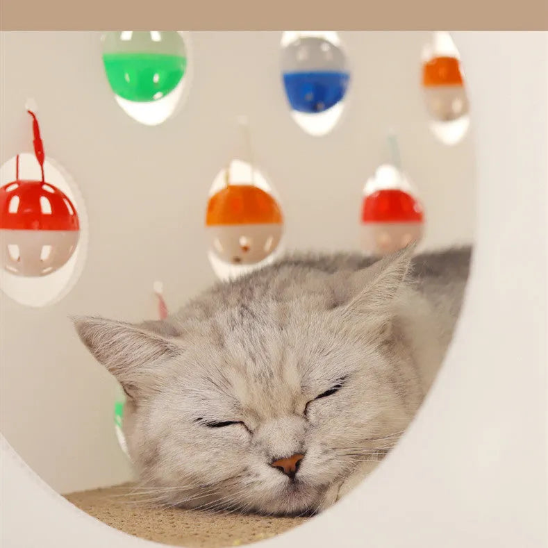Plastic cat scratch board integrated with a nest, a bell ball, and a tunnel for pet play and rest.