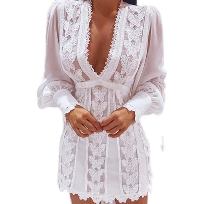 Elegant white lace dress with puff sleeves and butterfly design, perfect for special occasions