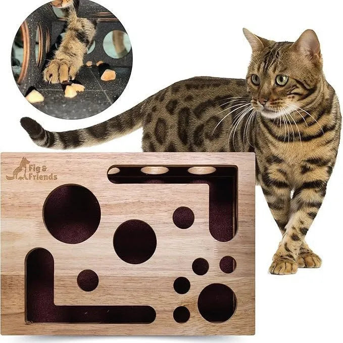 Solid wood square maze cat toy in natural wood colour on a floor